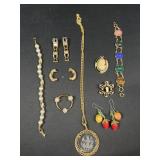 Misc costume jewelry trifari, scarab stone, and