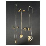 3 gold toned necklace and earring sets