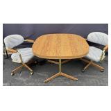 Table with 4 Cushioned Chairs and Leaf