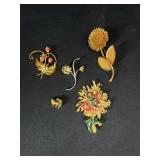 Floral brooches