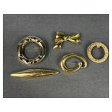 Gold tone brooches