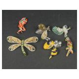Butterfly, bee, and more brooches