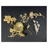 Floral brooches