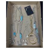 Silver and gold tone necklaces