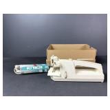 Hand Held Sewing machine