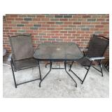 2 Folding Chairs and Outside Glass Top Table