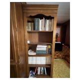 Pressboard bookcase with books