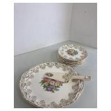 6 plates and a 7" Platter with Floral Pattern,