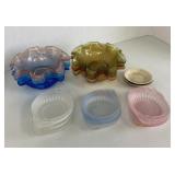 Lot of colorful fluted bowls and dishes