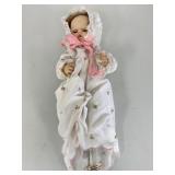 La Petite Boutique Porcelain Doll