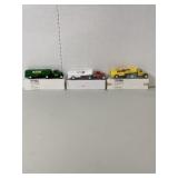3 Die Cast Tractor Trailer Banks, NIB