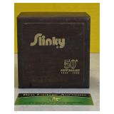 50 Year Golden Slinky in wooden Box