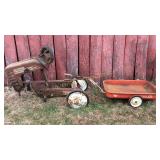 Antique metal tractor with wagon