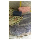 Towels, bed sheet, rug and trim