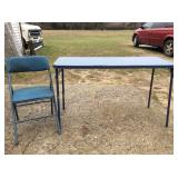 Blue folding table and chairs