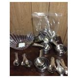 Measuring cups and plastic bowl