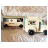 Toy ice cream truck and ambulance