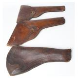 A Trio of Vintage Brown Leather Revolver Holsters