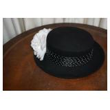 Black Hat with White Flower