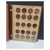 27 Kennedy Half Dollars in Book See Dates