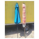 2 Umbrellas, Newer Orange + Used Umbrella