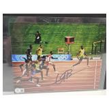 Signed Usain Bolt with Beckett COA Sticker