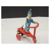 1950s Wind Up Clown On Scooter