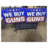 2 Plastic and Metal Frame WE BUY GUNS signs