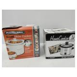 2 Slow Cookers- 1 1/2 Qt & 2 Qt.  In Boxes