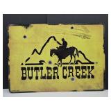 New Butter Creek Metal Gun Sign 19" x 13"