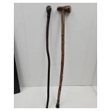 2 Primitive Hand Carved Walking Sticks 34.5" high