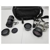 Minolta Maxxum Stsi 35 MM Camera X Lens