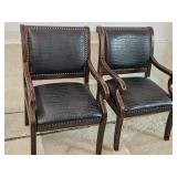 2 Armed Chairs One Has Damage on  Vinyl