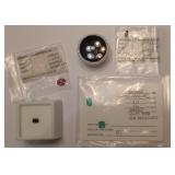 Emeralds, diamond, ruby, garnet 