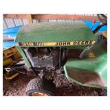 John Deere 318 with hydraulic plow 