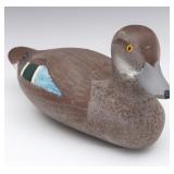 A BLUEBILL HEN WOOD DECOY SIGNED CLARENCE BAUER