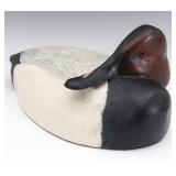 A RESTING CANVASBACK DRAKE WOOD DECOY A RESTING CANVASBACK DRAKE WOOD DECOY