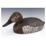 A CANVASBACK HEN DECOY SIGNED MELVIN J. PIGGOTT