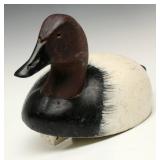 A CARVED AND PAINTED CANVASBACK DRAKE DECOY