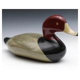 A CANVASBACK DRAKE CARVED AND PAINTED WOOD DECOY