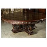 A MASSIVE CARVED OAK DINING TABLE W/ FEMALE SPHINX