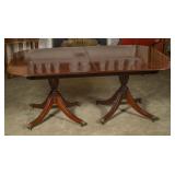 A LATE 20TH C. MAHOGANY REGENCY DINING TABLE