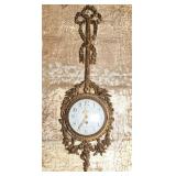A LOUIS XIV STYLE CARVED AND GOLD LEAF WALL CLOCK