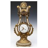 A FRENCH LOUIS XVI STYLE ORMOLU & ALABASTER CLOCK
