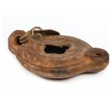 A ROMAN PERIOD CLAY OIL LAMP