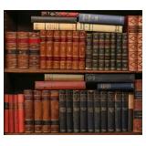 A COLLECTION OF BOOKS INCLUDING 26 LEATHER BOUND