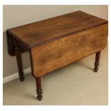 A 19TH CENTURY AMERICAN DROP LEAF TABLE