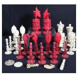 AN INCOMPLETE CARVED CHESS SET, AS FOUND CONDITION