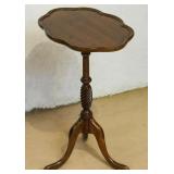 A CONTEMPORARY TRIPOD STAND TABLE