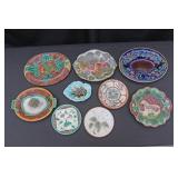 NINE ANTIQUE MAJOLICA PLATES AND TRAYS